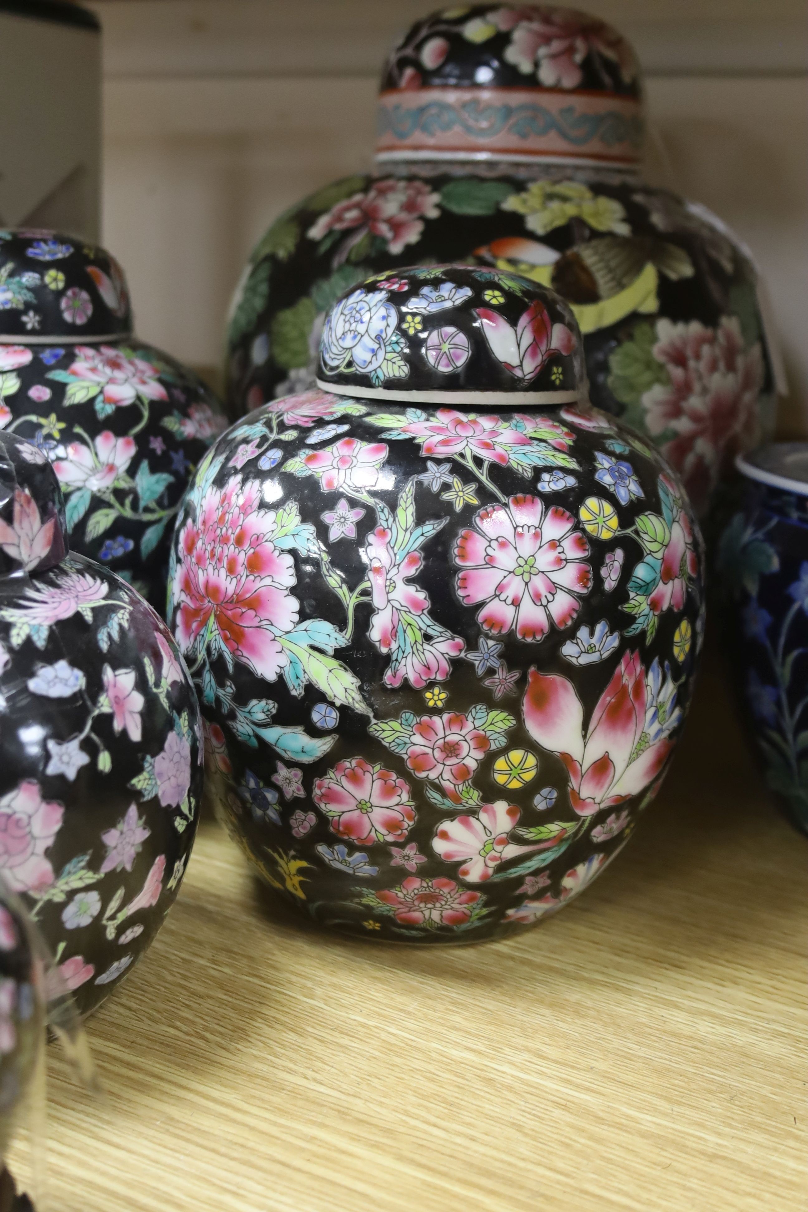 Six Chinese famille rose jars and a jardiniere